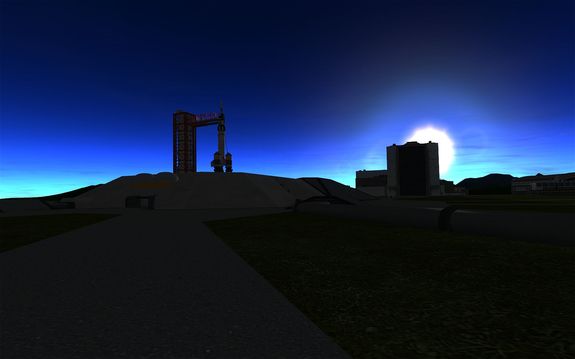 one of the 'pad workers took this photo of Kerbin V ready to go as the sun sets behind the VAB