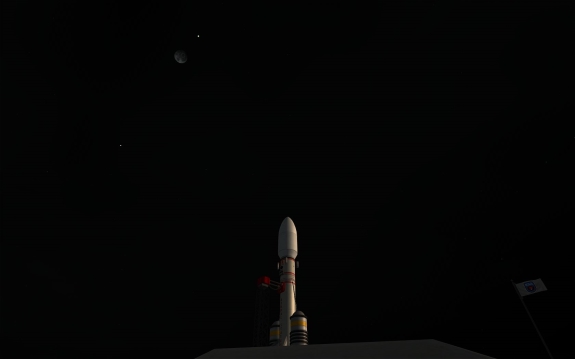 workers have cleared the launchpad & ComSat III sits pointed at the heavens - which include Duna & Jool next to Mun